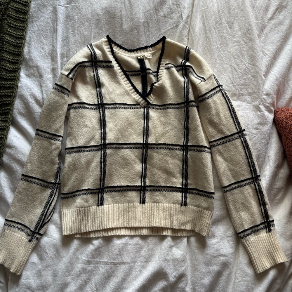 Moth Cream and Black V-Neck Sweater with Geometric Pattern